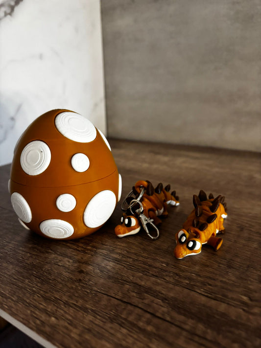 Flexi Stegosaurus – beweglicher 3D Druck Dinosaurier – Schlüsselanhänger oder Ei-Nest – Wunschfarbe